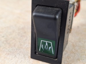 Klawisz, włącznik, przycisk włączający ogrzewanie postojowe w autobusie, nr 511.232